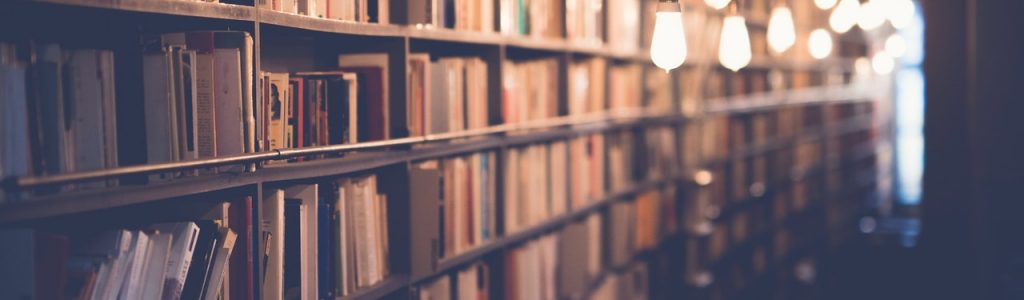 blur-book-stack-books-bookshelves-590493