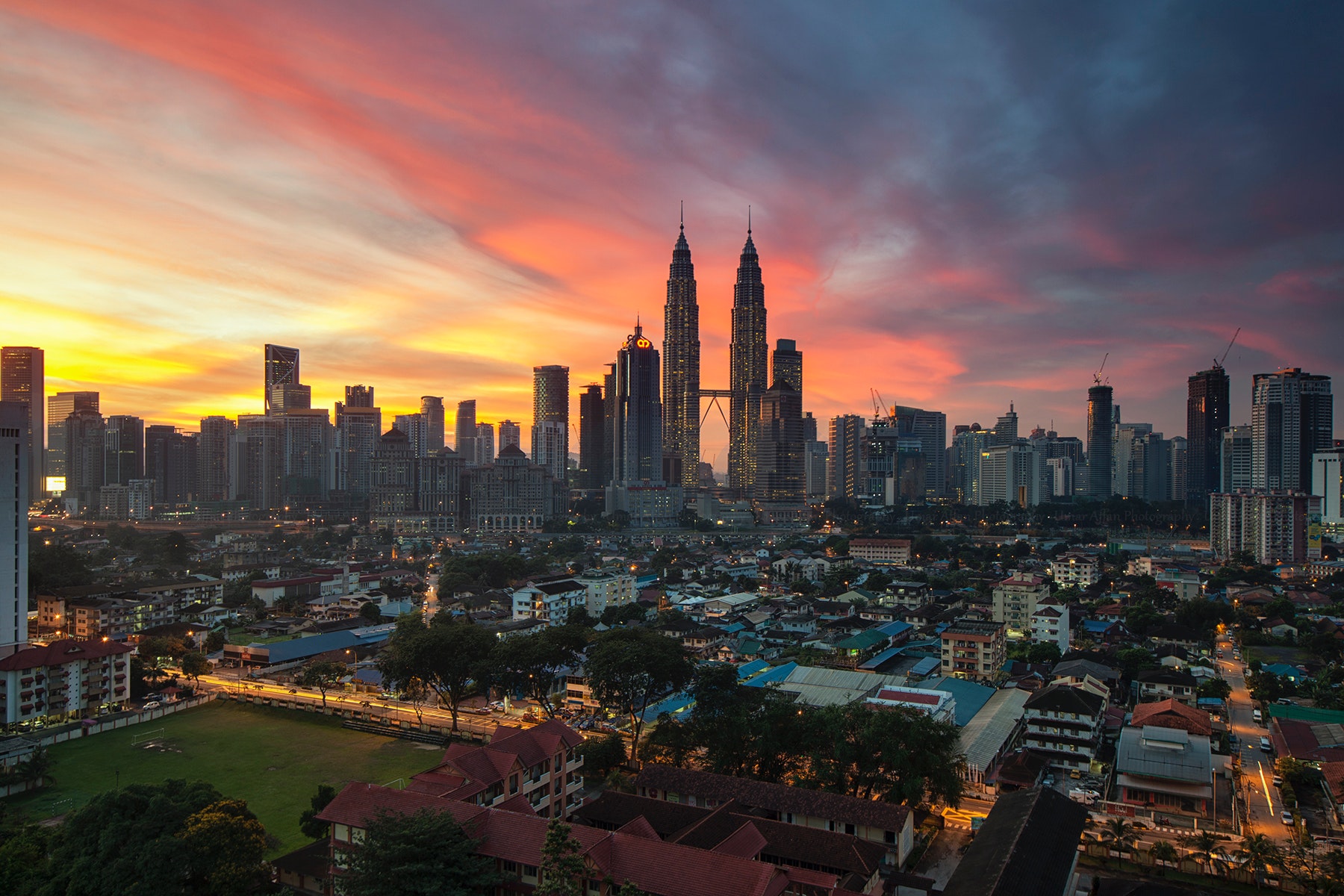 village-buildings-sunrise-skyscrapers-94420